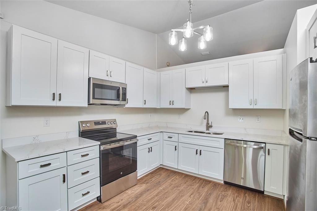 Photo of 714 Woodbury Knolls Drive, Winston-Salem, NC 27104 (MLS # 1219281)