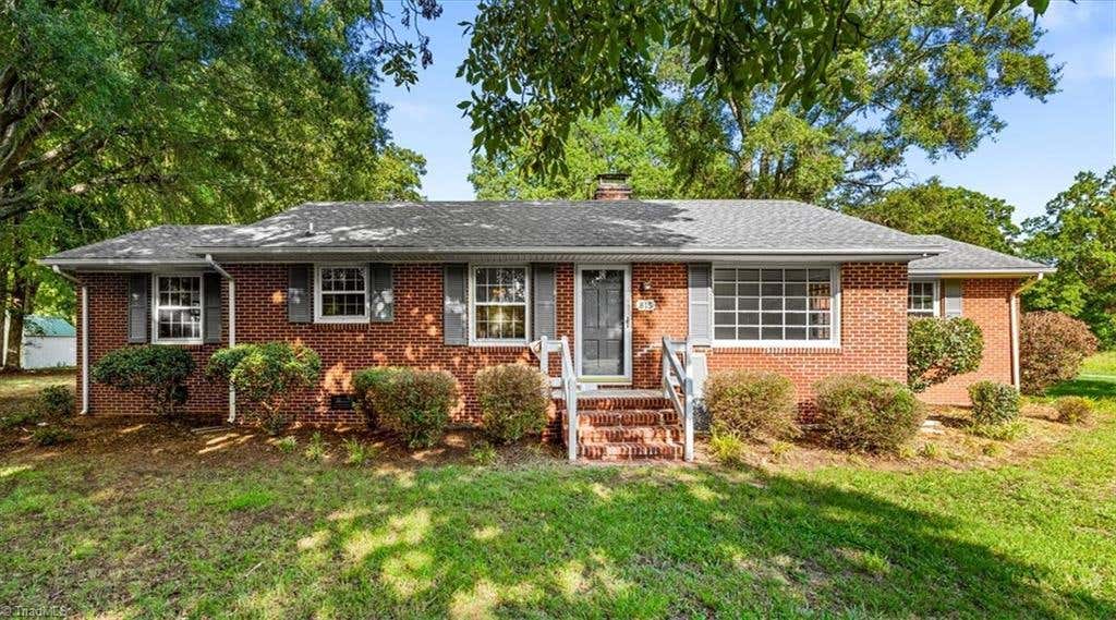 Photo of 815 Coleman Drive, Whitsett, NC 27377 (MLS # 1230082)