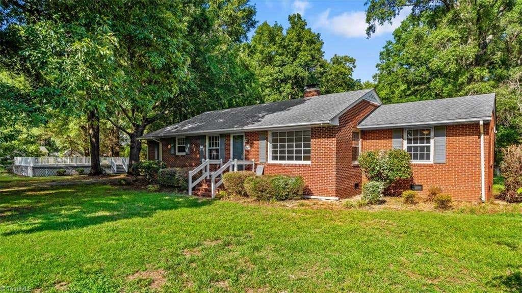 Photo of 815 Coleman Drive, Whitsett, NC 27377 (MLS # 1230082)
