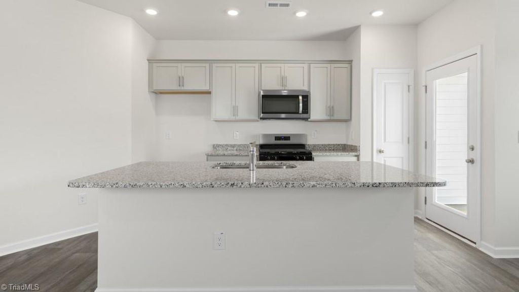 Photo of 802 Gaelic Drive, Gibsonville, NC 27249 (MLS # 1207389)