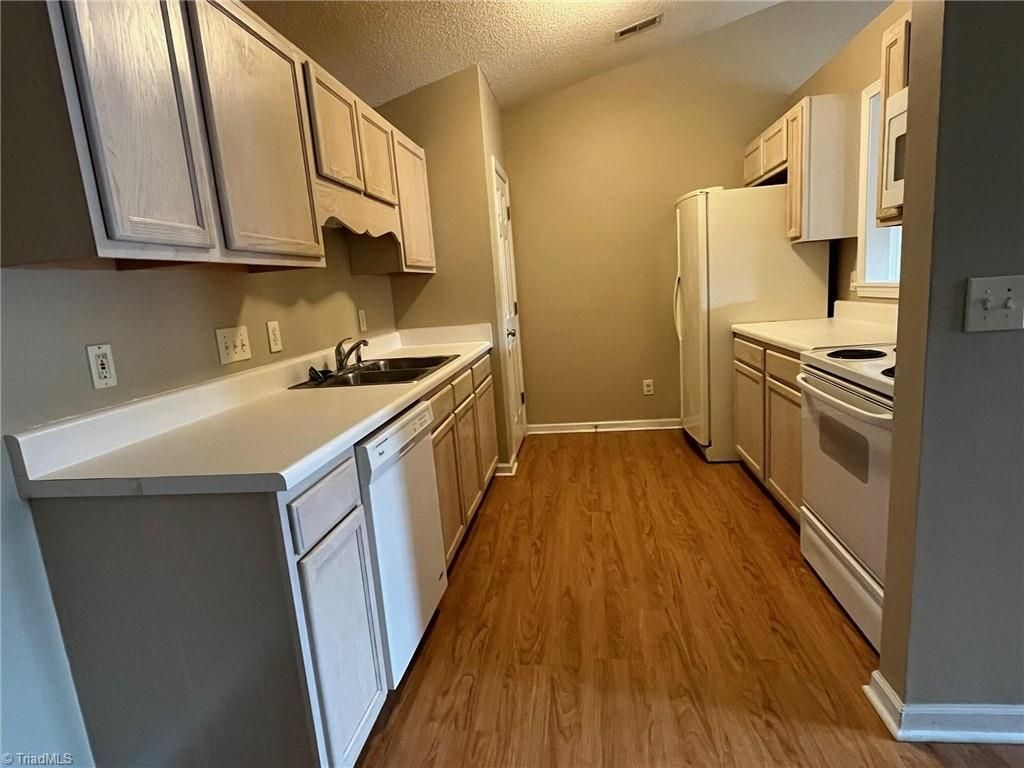 Photo of 7135 Friendly Avenue W #G, Greensboro, NC 27410 (MLS # 1205508)