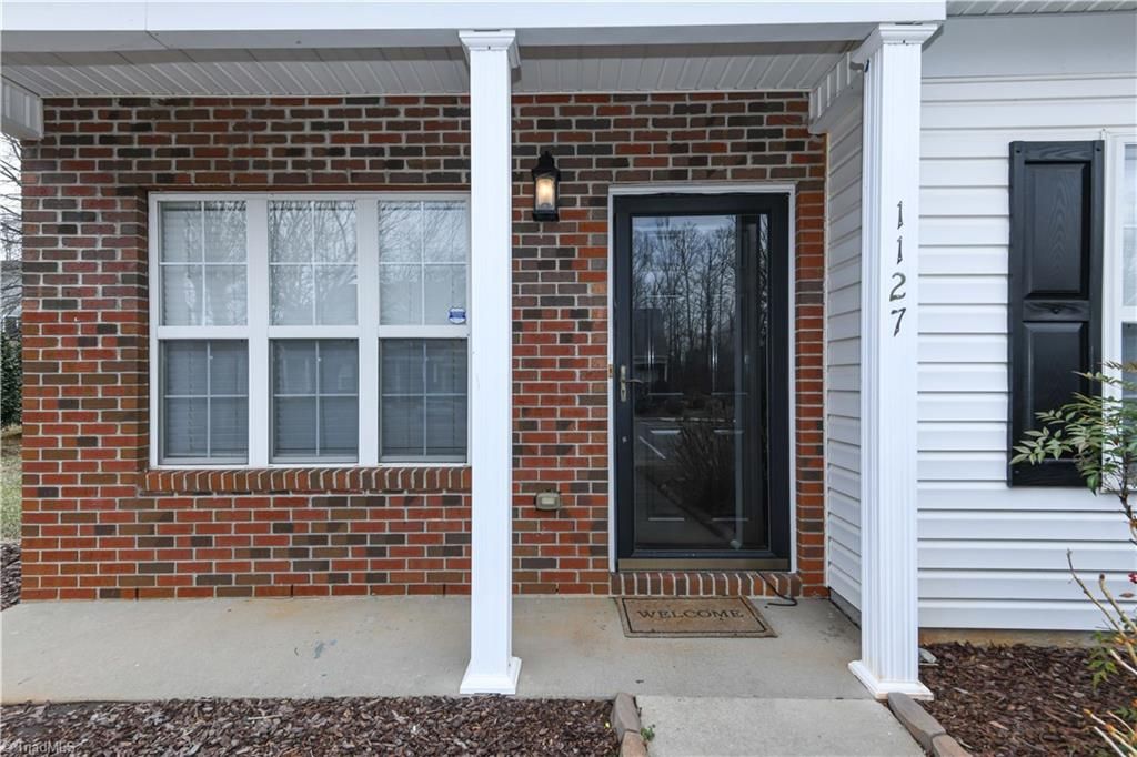 Photo of 1127 Oak Blossom Way, Whitsett, NC 27377 (MLS # 1209158)