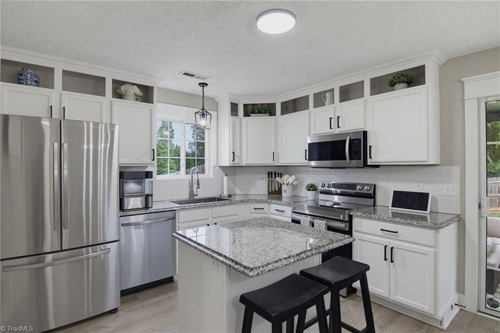 Photo of 913 Topsail Drive, Browns Summit, NC 27214 (MLS # 1224928)