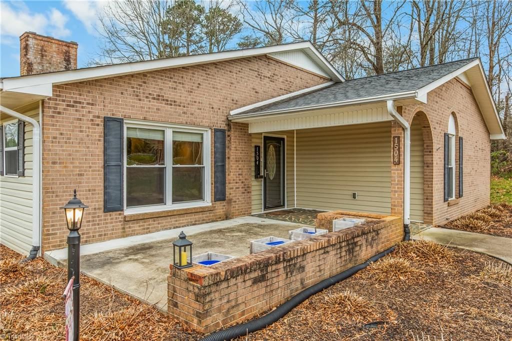 Photo of 1504 Edgewood Drive, Yadkinville, NC 27055 (MLS # 1212899)
