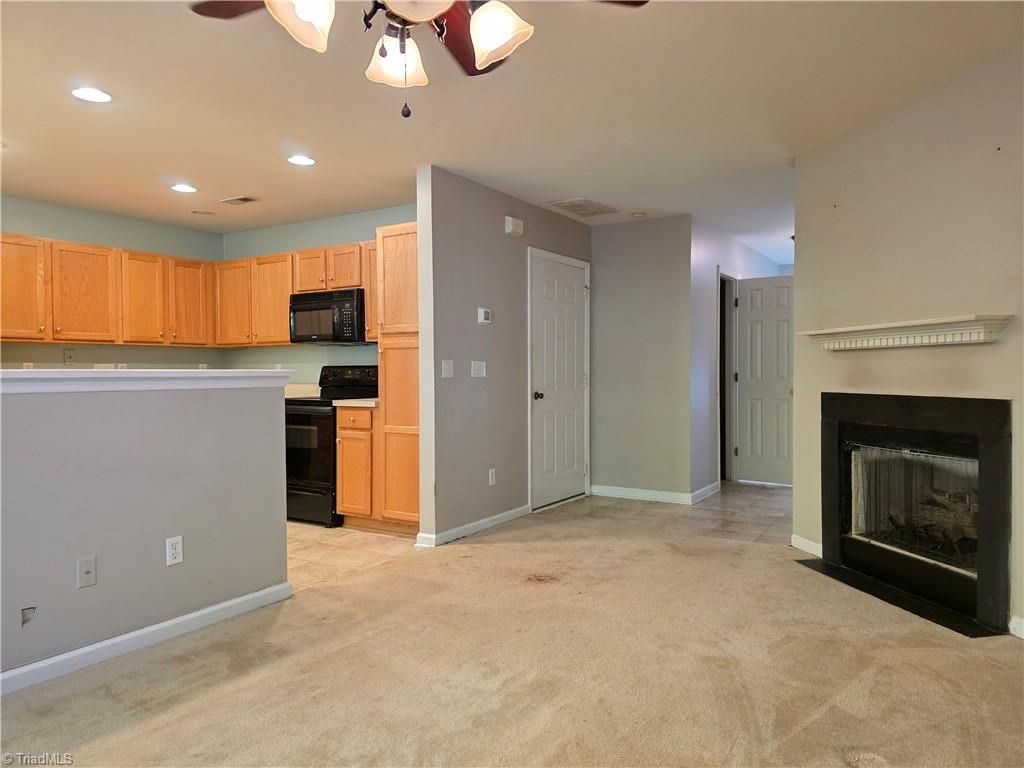 Photo of 6321 Double Eagle Drive, Whitsett, NC 27377 (MLS # 1199394)