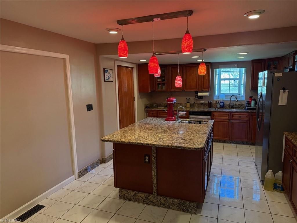 Photo of 1411 Bridgton Road, Winston-Salem, NC 27127 (MLS # 1213974)