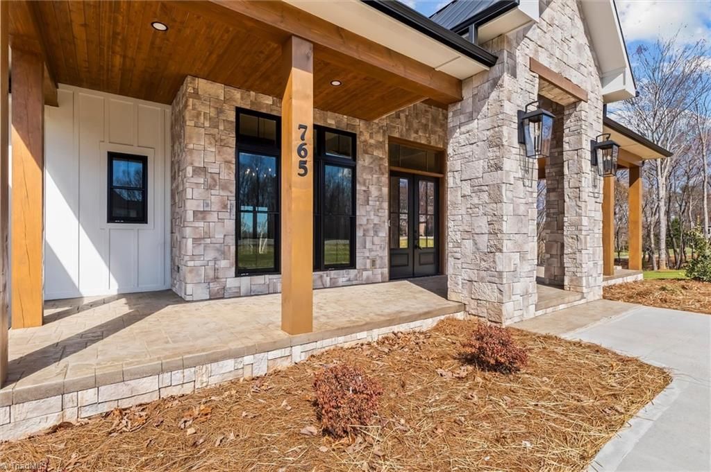 Photo of 765 Golf Course Road, Pilot Mountain, NC 27041 (MLS # 1211956)