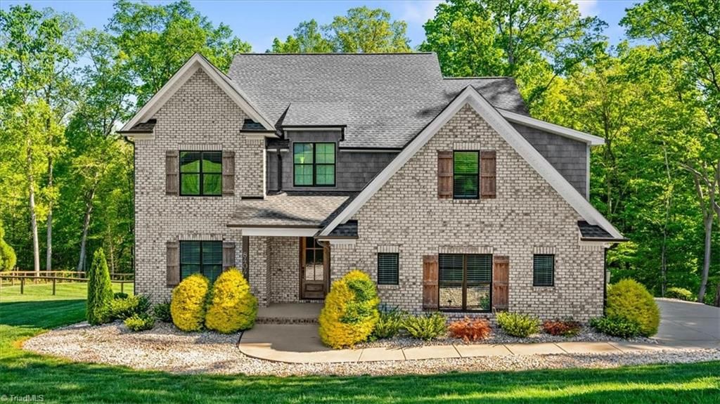 Photo of 8404 Poplar Bluff Drive, Stokesdale, NC 27357 (MLS # 1216402)