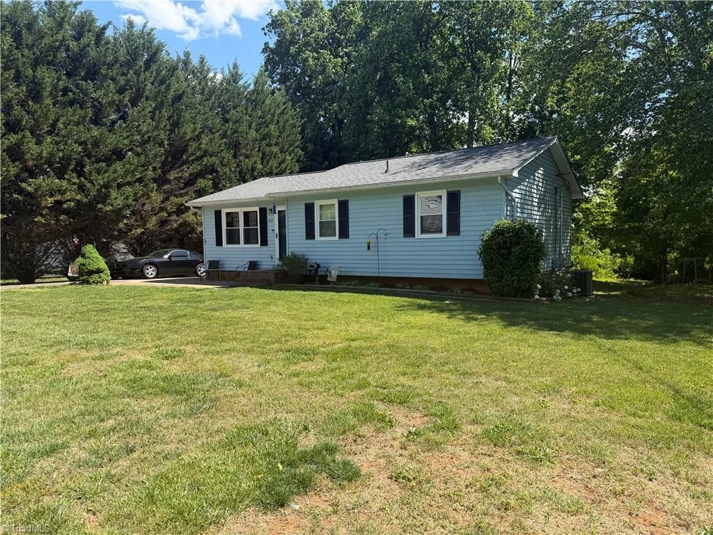 Photo of 402 Williams Street, Boonville, NC 27011 (MLS # 1218244)