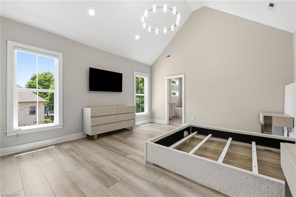 Welcome to this modern custom luxury home by Walraven Signature Homes, – image 28