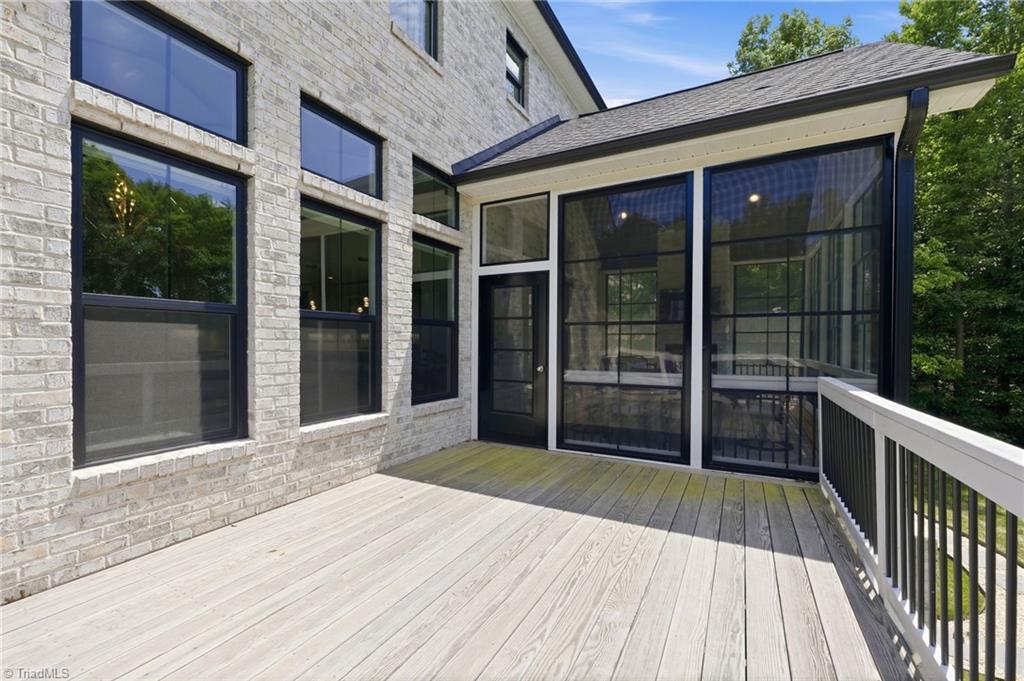 Welcome to this modern custom luxury home by Walraven Signature Homes, – image 43