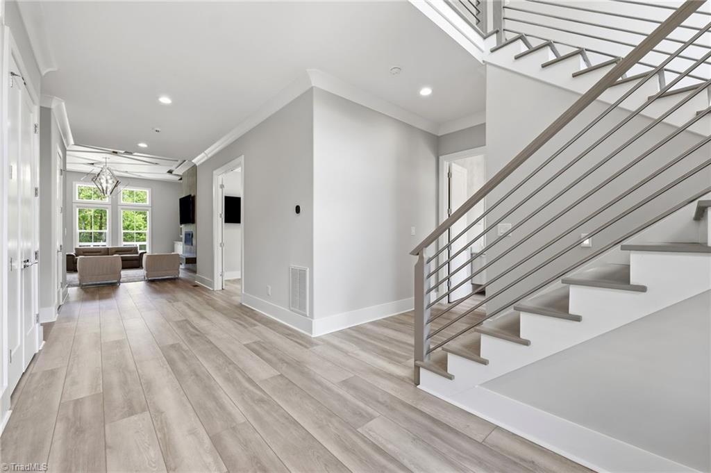 Welcome to this modern custom luxury home by Walraven Signature Homes, – image 3