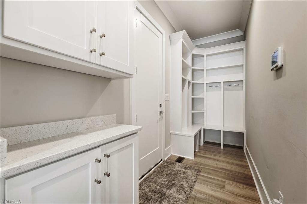 Welcome to this modern custom luxury home by Walraven Signature Homes, – image 17