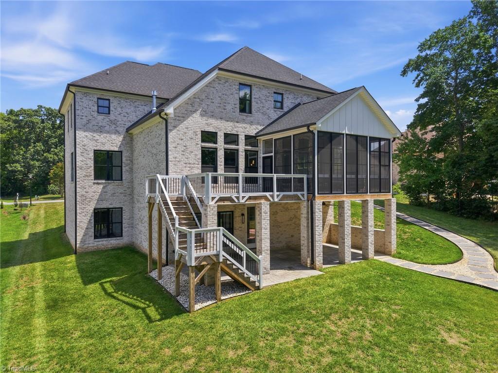 Welcome to this modern custom luxury home by Walraven Signature Homes, – image 49