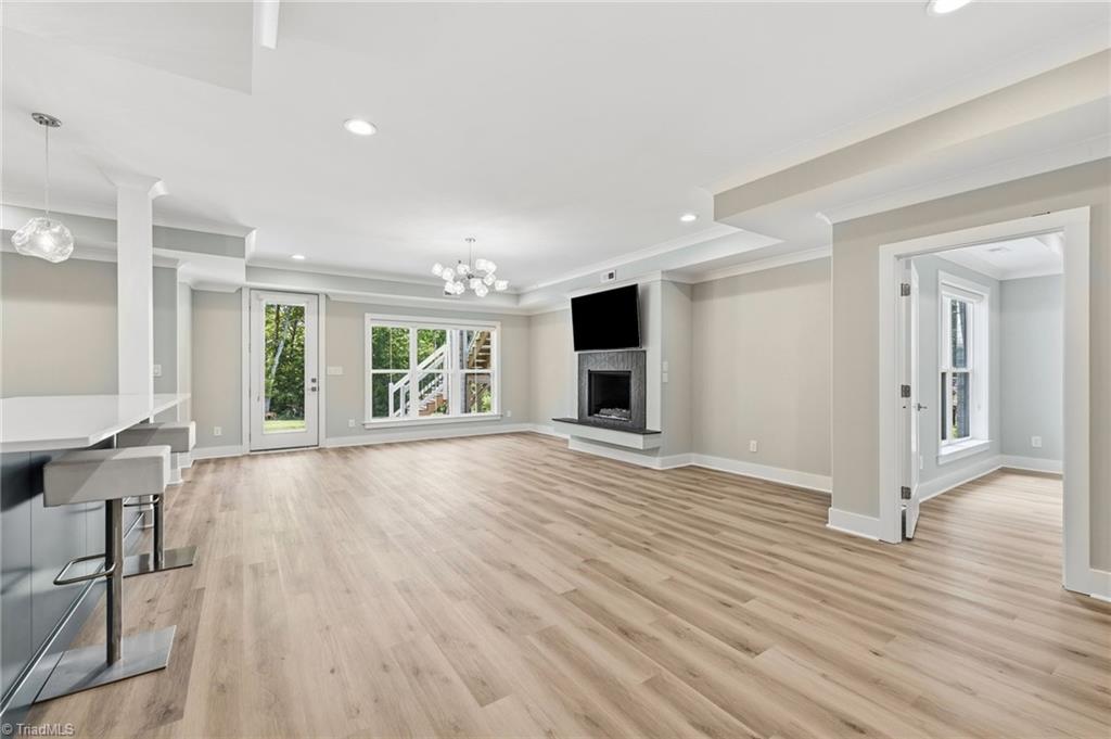 Welcome to this modern custom luxury home by Walraven Signature Homes, – image 34