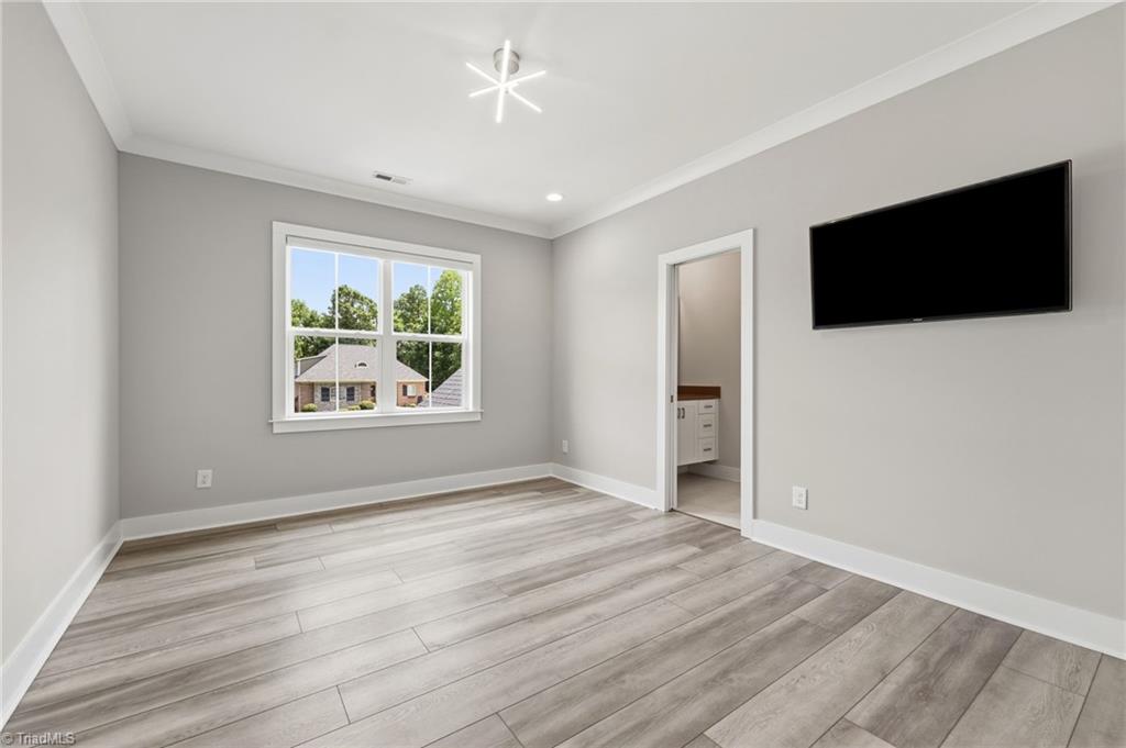 Welcome to this modern custom luxury home by Walraven Signature Homes, – image 22