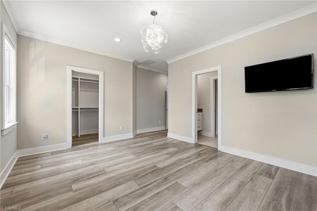 Welcome to this modern custom luxury home by Walraven Signature Homes, – image 26