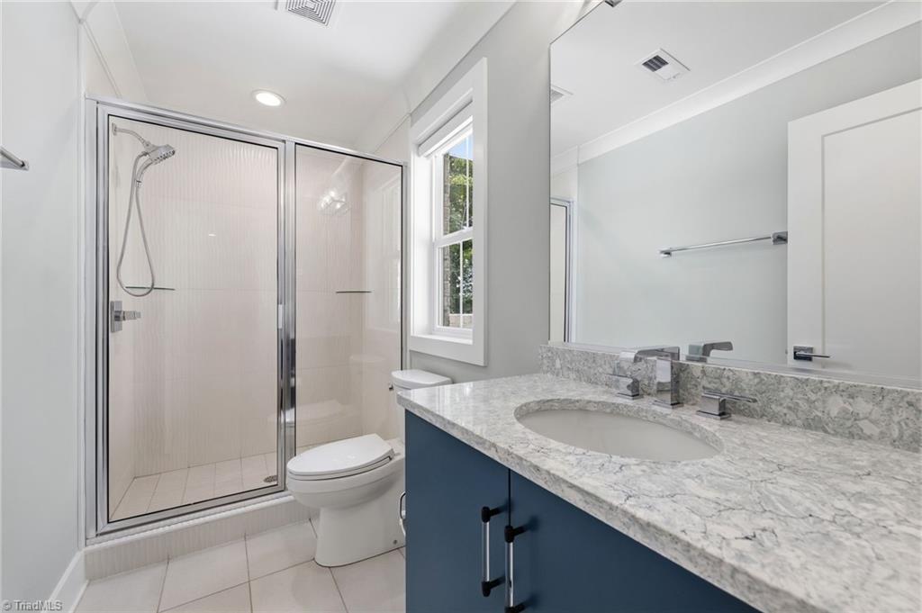 Welcome to this modern custom luxury home by Walraven Signature Homes, – image 39