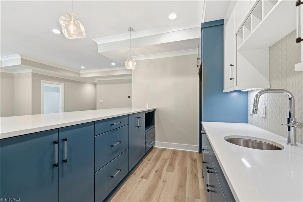 Welcome to this modern custom luxury home by Walraven Signature Homes, – image 36