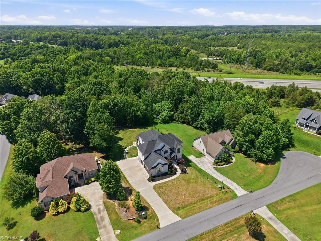 Welcome to this modern custom luxury home by Walraven Signature Homes, – image 50