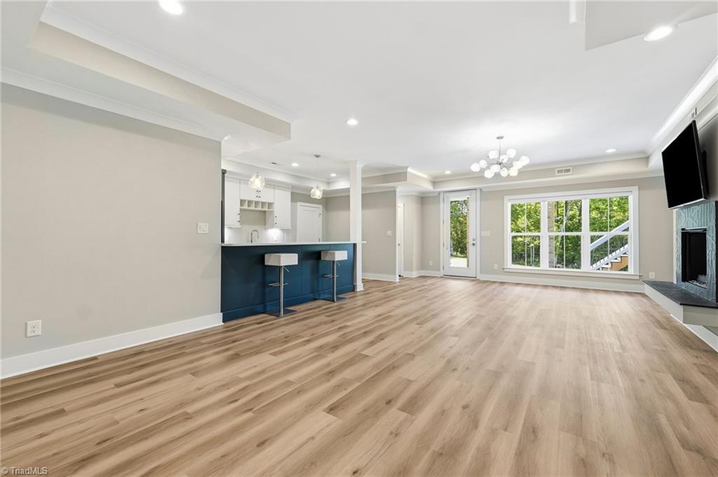 Welcome to this modern custom luxury home by Walraven Signature Homes, – image 33