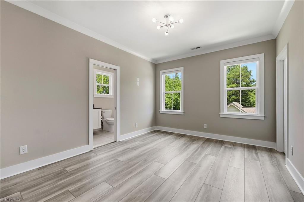 Welcome to this modern custom luxury home by Walraven Signature Homes, – image 18