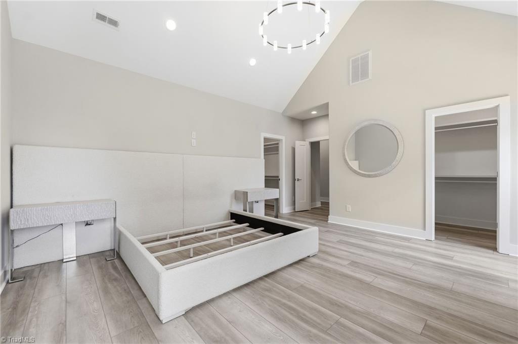 Welcome to this modern custom luxury home by Walraven Signature Homes, – image 29