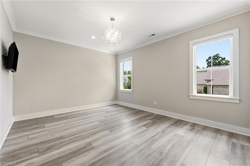 Welcome to this modern custom luxury home by Walraven Signature Homes, – image 25
