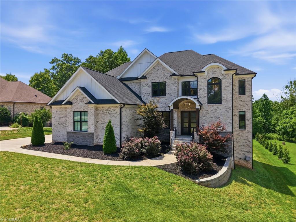 Welcome to this modern custom luxury home by Walraven Signature Homes, – image 1