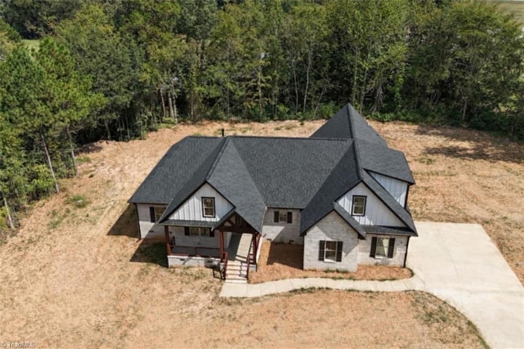 Photo of 7676 Caber Road, Browns Summit, NC 27214 (MLS # 1207434)