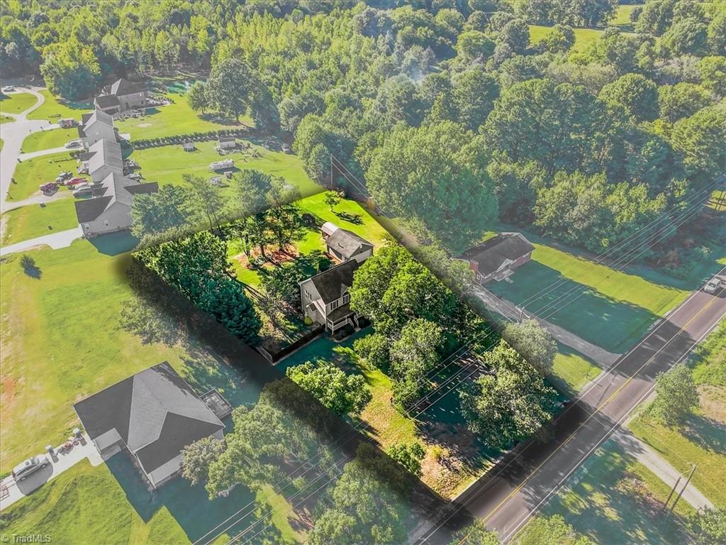 Photo of 7053 McLeansville Road, Browns Summit, NC 27214 (MLS # 1237057)