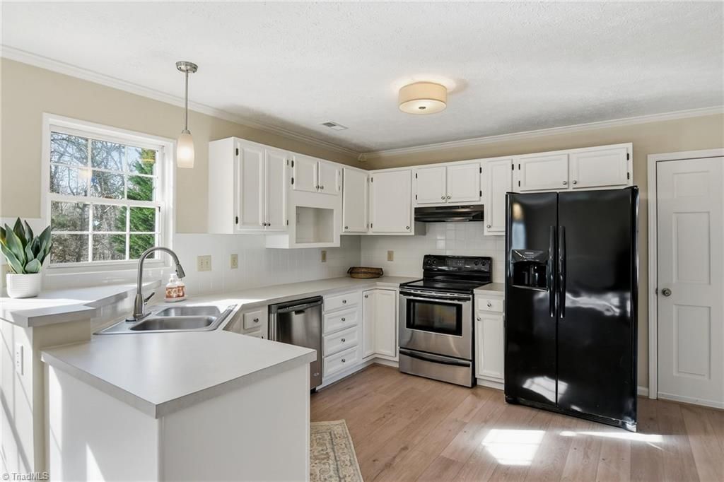 Photo of 5965 Bethania Tobaccoville Road, Pfafftown, NC 27040 (MLS # 1206374)