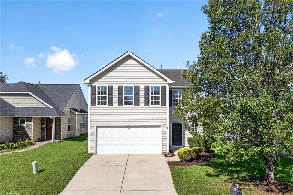 Photo of 688 Winners Point, Whitsett, NC 27377 (MLS # 1235589)
