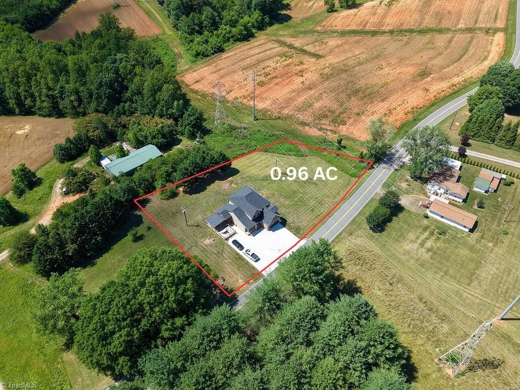 Photo of 1097 Dodson Mill Road, Pilot Mountain, NC 27041 (MLS # 1224864)