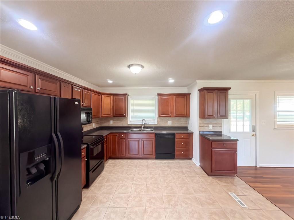 Photo of 637 Williamsdale Road, Graham, NC 27253 (MLS # 1239283)