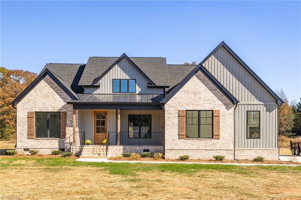 Photo of 519 S Bunker Hill Road, Colfax, NC 27235 (MLS # 1185837)