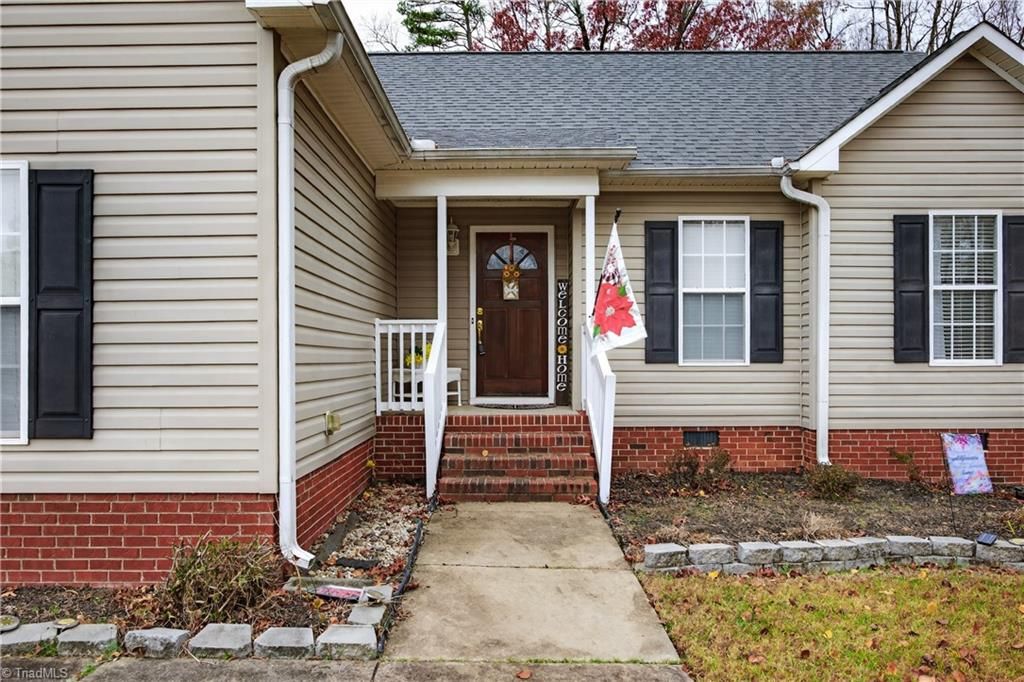 Photo of 210 Cushman Road, Gibsonville, NC 27249 (MLS # 1203470)