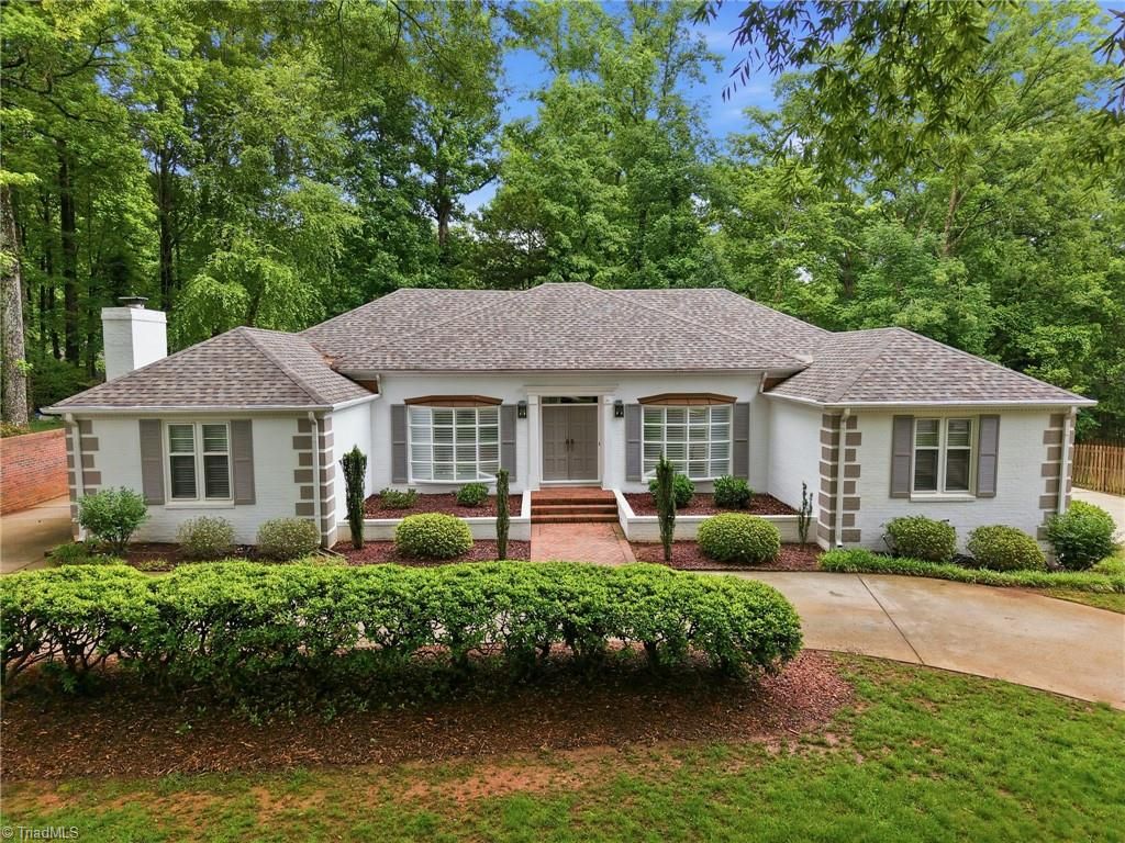 Photo of 702 Westminster Drive, Greensboro, NC 27410 (MLS # 1221991)