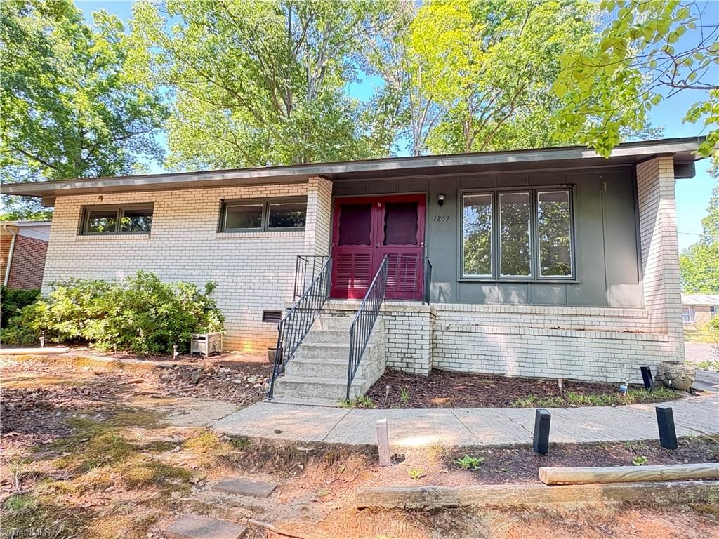Photo of 1207 Cliffwood Drive, Greensboro, NC 27406 (MLS # 1218799)