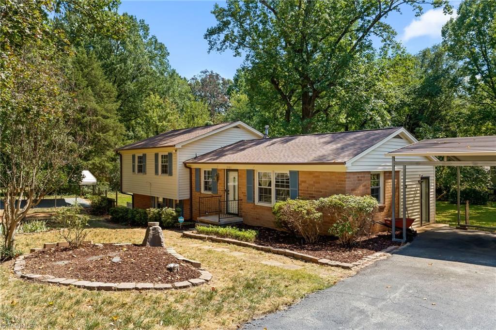 Photo of 5701 Buddingwood Drive, Greensboro, NC 27409 (MLS # 1236363)