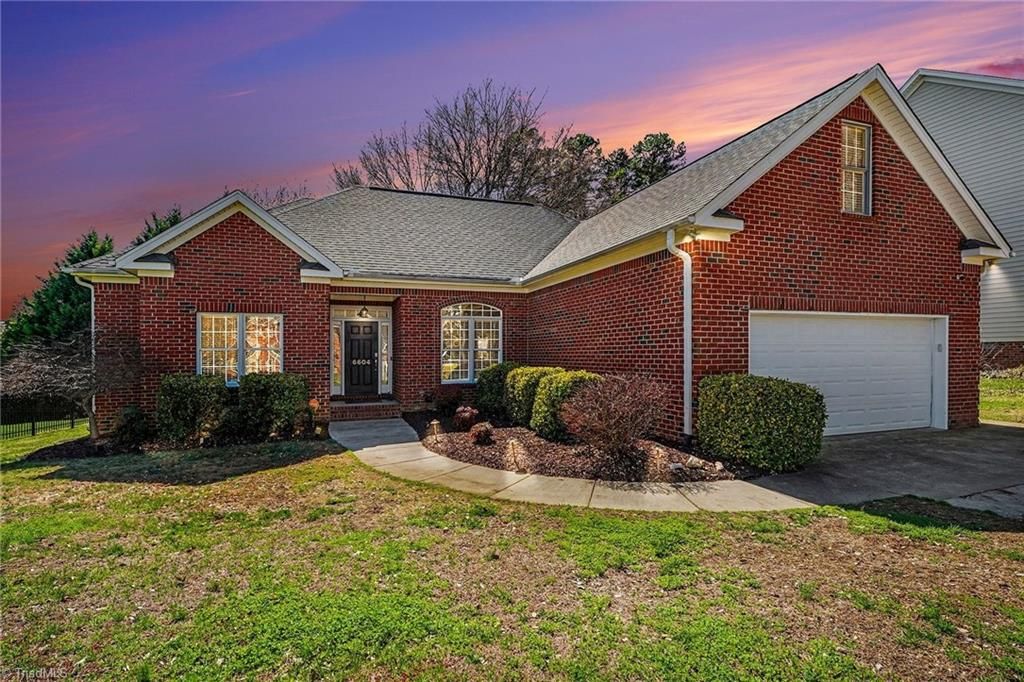 Photo of 6604 Barton Creek Court, Whitsett, NC 27377 (MLS # 1212116)