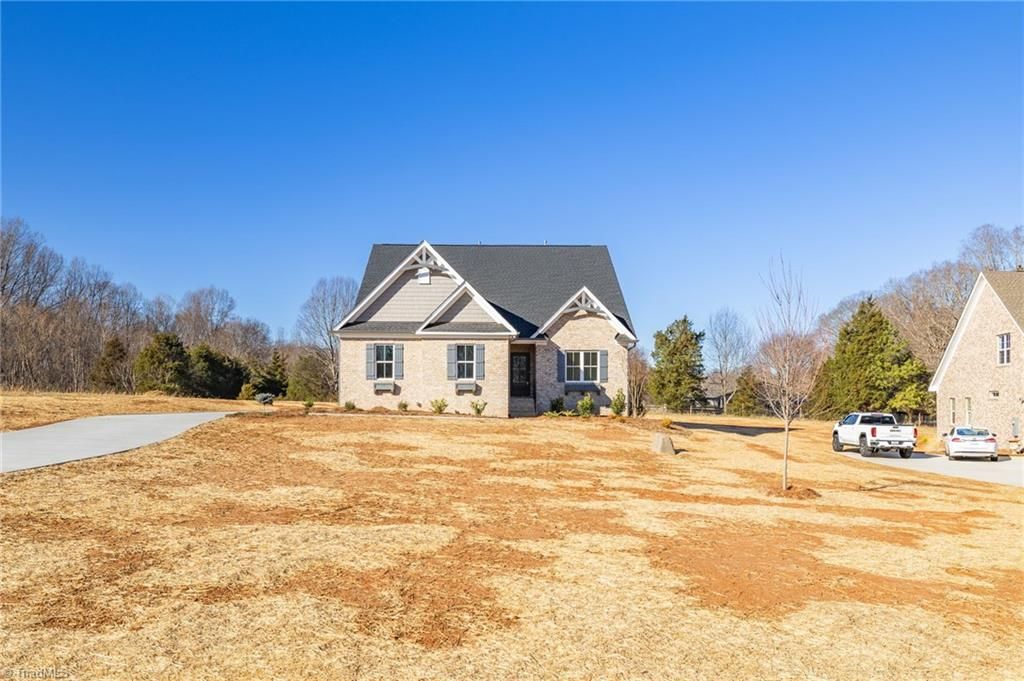 Photo of 8305 Pyramid Drive, Summerfield, NC 27358 (MLS # 1198174)