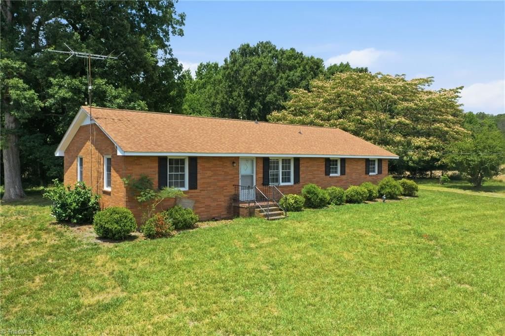 Photo of 3075 County Farm Road, Gibsonville, NC 27249 (MLS # 1225377)