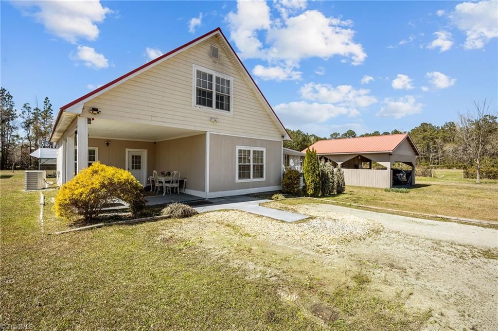 Photo of 848 Chair Factory Road, Nakina, NC 28455 (MLS # 1213169)