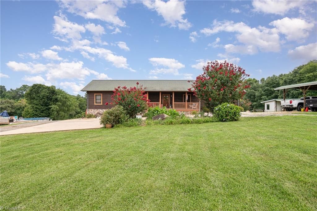 Photo of 300 Tom Hunter Road, Pilot Mountain, NC 27041 (MLS # 1200325)