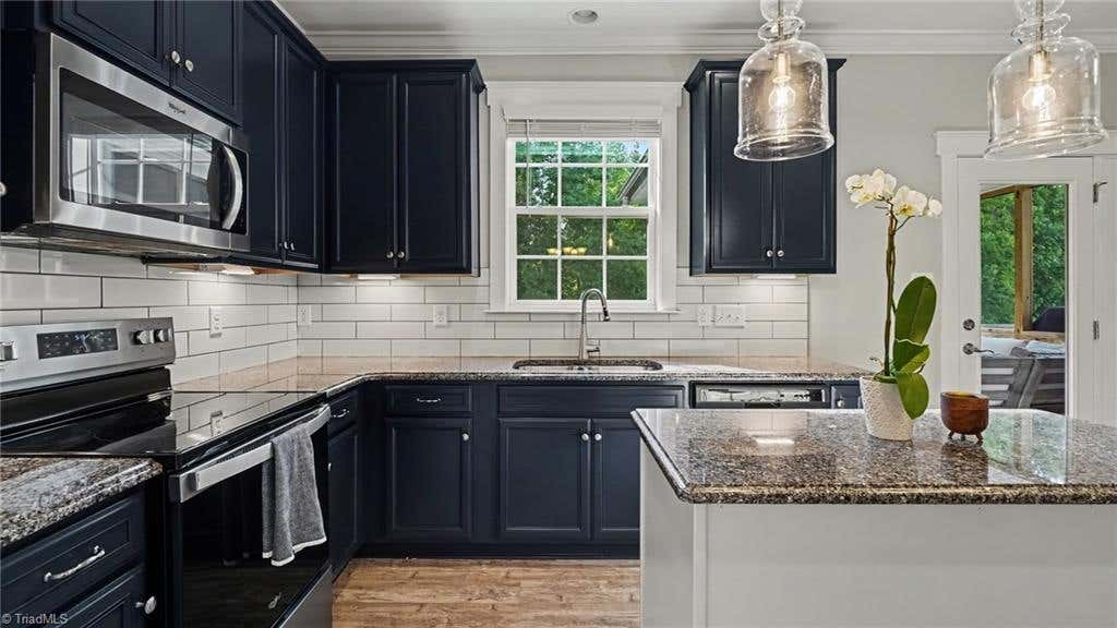 Photo of 7611 Mary Ellen Court, Greensboro, NC 27409 (MLS # 1230537)