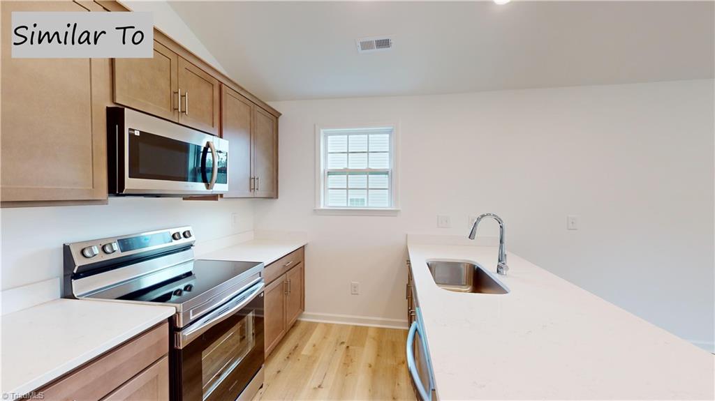 Photo of 6837 Maize Drive, High Point, NC 27265 (MLS # 1237448)