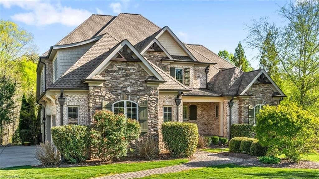 Photo of 8863 Cravenwood Drive, Oak Ridge, NC 27310 (MLS # 1213895)