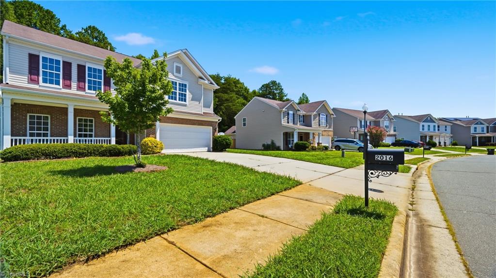 Photo of 2016 Heron Pointe Drive, Whitsett, NC 27377 (MLS # 1237489)