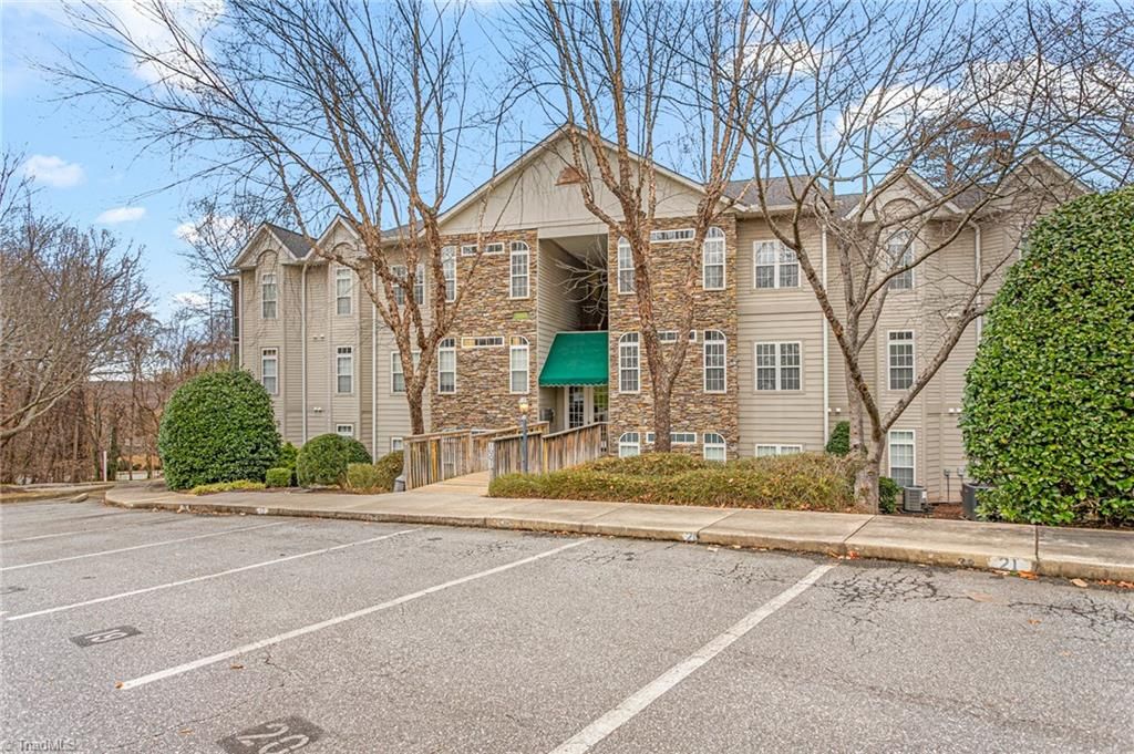 Photo of 3001 Greystone Point #J, Greensboro, NC 27410 (MLS # 1203419)